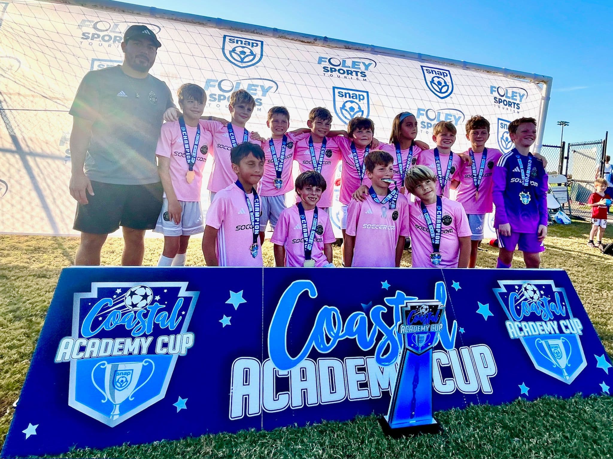 Team celebration and awards - Coastal Academy Cup champions